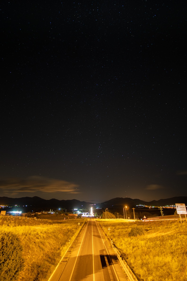 A spanish street going into the milkyway.