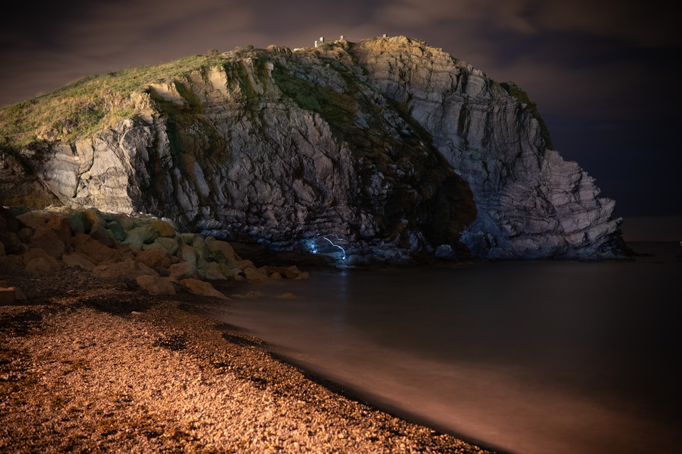 A nocturnal scence solely lit by light pollution with unintented light paiting